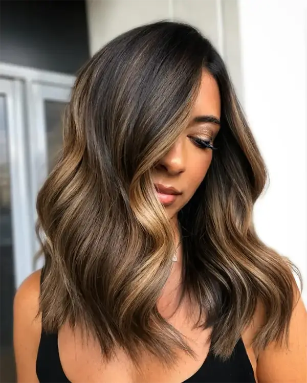 Dark Brown Hair with Golden blonde highlights.