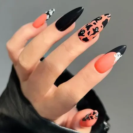 Glow-in-the-Dark Ghosts - halloween nail design